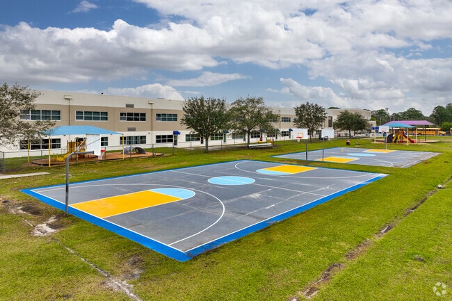 The large colorful basketball courts are popular during recess at Odyssey Prep Academy.