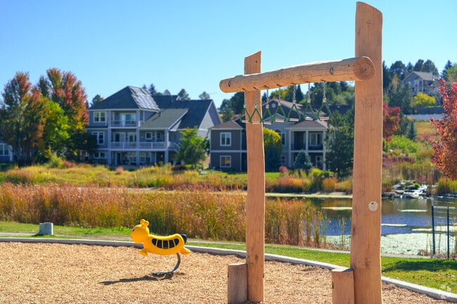 Eagle Meadows Park in Meadows features landscaped green spaces surrounding the playground.