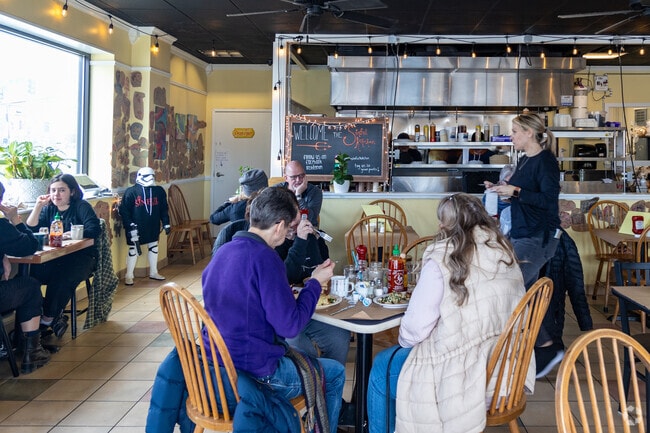 The Sinful Kitchen is a comfy nook with local art near Stroudwater.
