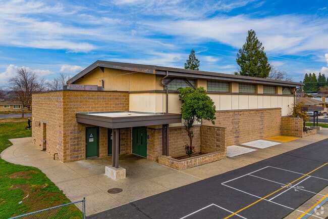 Bricked walls line the exterior of this Greenhills Elementary School building.