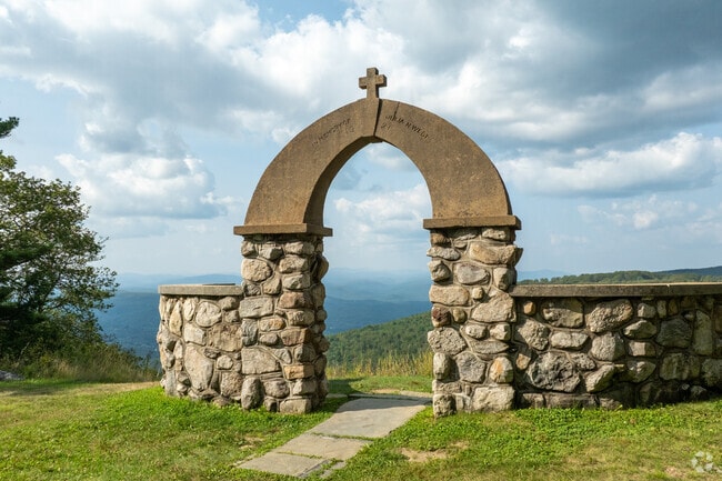 The Cragsmoor Stone Church arch is a local landmark with a breathtaking view on the other side.