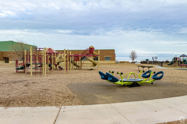Squire John Thomas Elementary School has playground equipment for the kids.