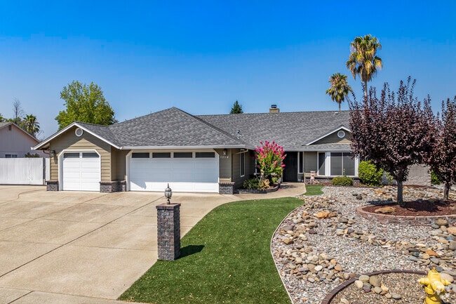 This single-story rancher has a water friendly front yard in Hawley.