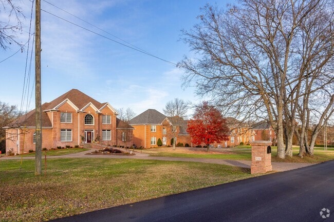 Home sizes vary in Hendersonville, including large red-brick homes.