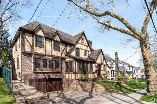 Tudor-inspired residences with landscaped lawns start at around $800,000 in Randall Manor.