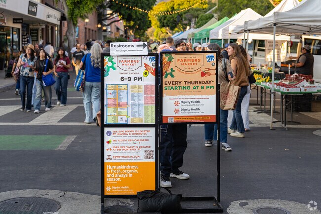 A sign of events is displayed for residents to see at the Downtown SLO Farmers' Market.