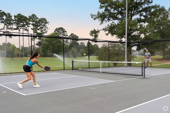 Play a round of pickleball at Doublegate Country Club near Saint Andrews.