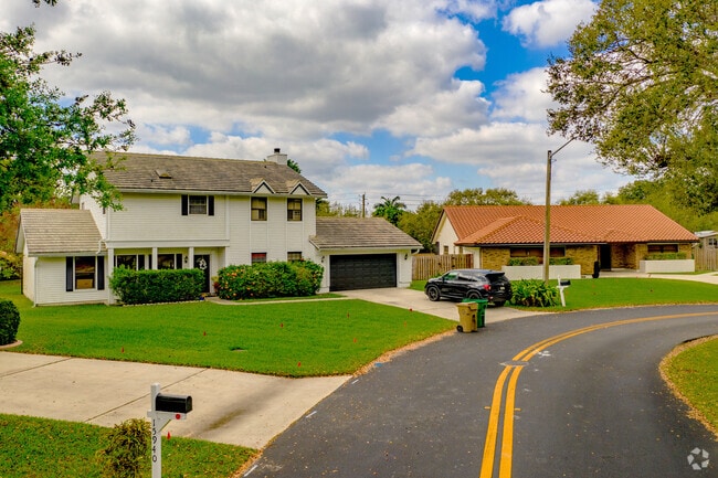 Well-manicured lawns are a frequent sight in the Hawke's Bluff neighborhood.