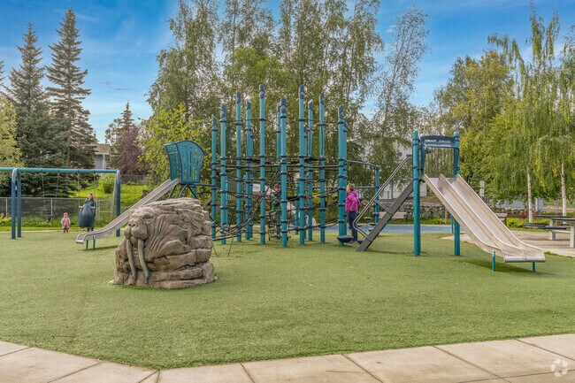 Children enjoy the inclusive playground at David Green Park in Tudor Area.