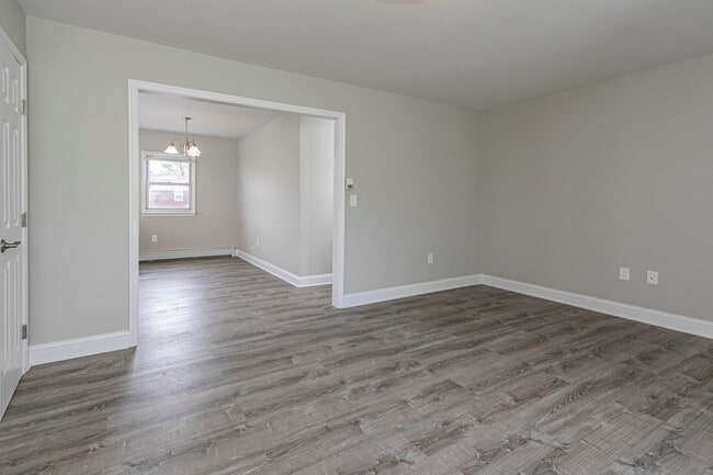 Modern grey composite flooring, luxurious molding and custom paint