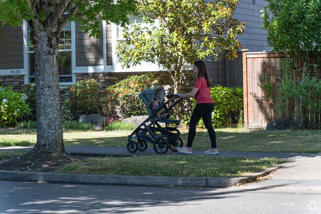 Holiday Hills residents love the wide sidewalks shaded by tall trees.