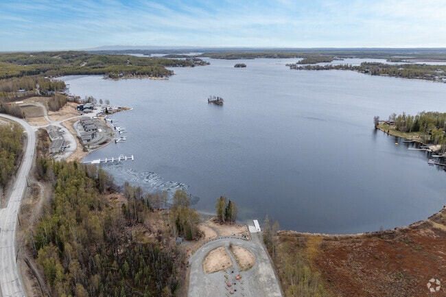 The Big Lake neighborhood includes a brewery on the lake and public access at parks like Big Lake South State Recreation Site.