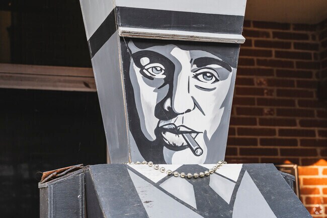 Some businesses in downtown Tiffin display decorated wooden nutcrackers like Al Capone who stands guard in front of The Renaissance, a great place to enjoy a bourbon and cigar.