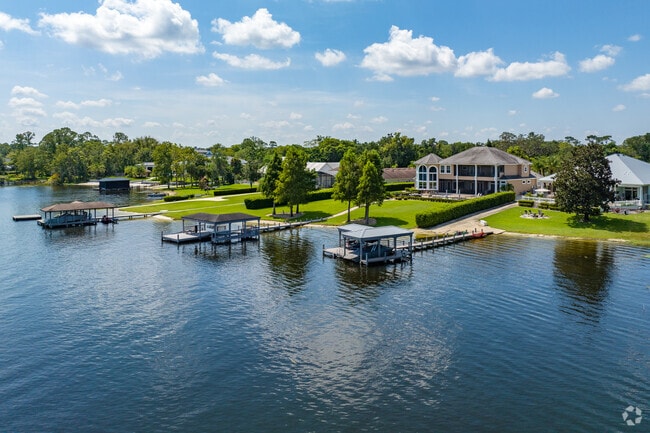 Waterfront homes with large docks and boats are abundant in the 