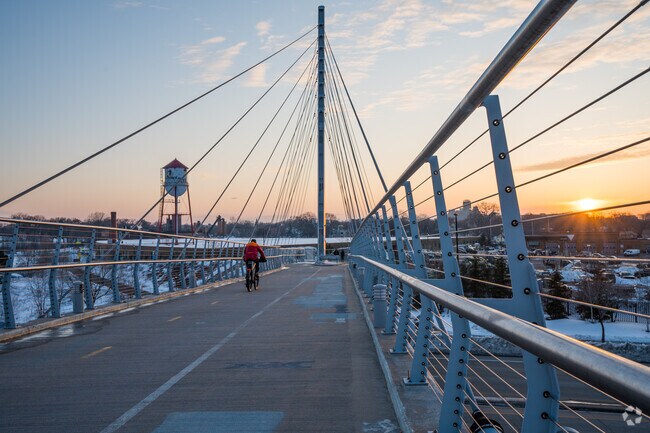Take a bike ride over the Martin Olav Sabo Bridge in Longfellow.