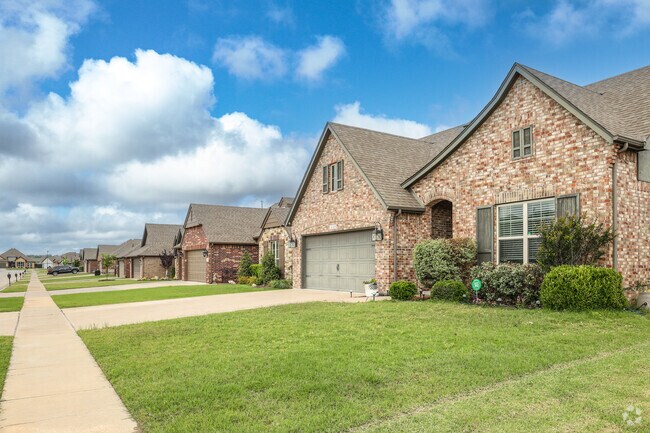 Modern brick builds on small lots all have sidewalks for added safety in Stone Creek Farms.