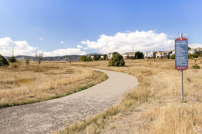 Ralston Creek Trail winds through Spring Mesa, offering a peaceful path for residents.