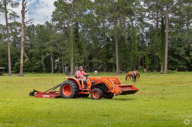 Horses and tractors are common on rural properties in Sterling.