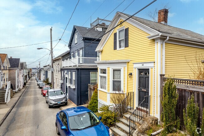 Colorful homes line the narrow streets of Historic Hill, adding vibrancy to the neighborhood.
