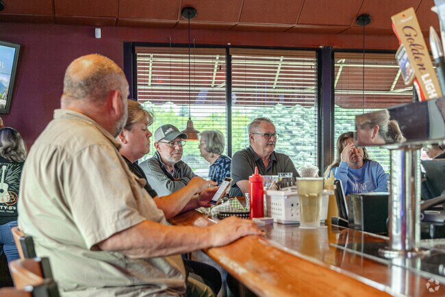 Enjoy the company of neighborhood locals at 5-8 Grill & Bar.