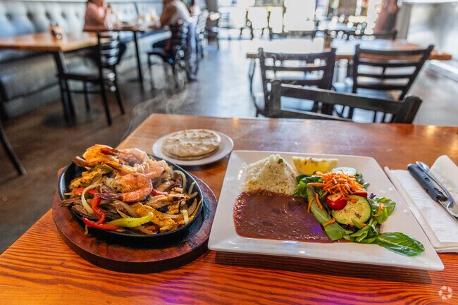 Spice it up with some Salvadoran Food from El Cuscatlan in New Pacific.