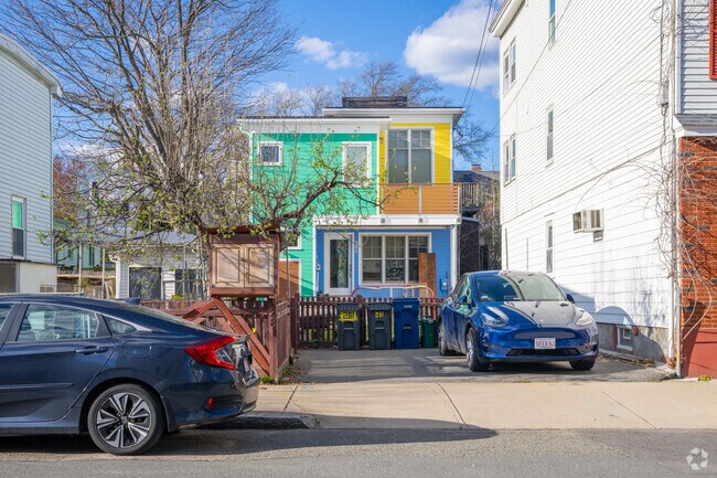 You might come across a home in East Cambridge that will truly brighten up your day.