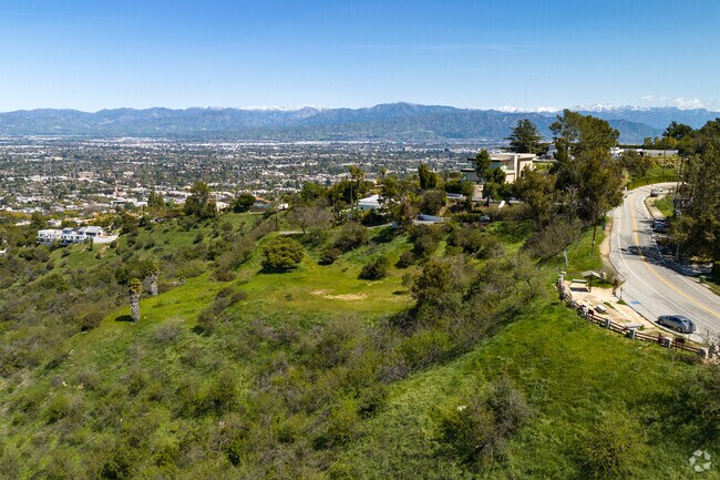 Stop on a hilltop to see views of Studio City.
