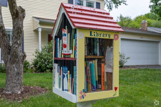 In the Brush Hill neighborhood, a small free library offers books for both children and adults.