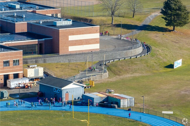 Lewis S. Mills High School, is part of Connecticut Regional School District 10.