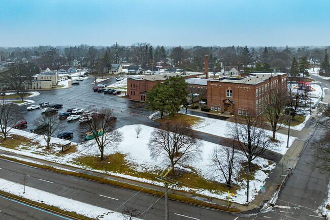 St John Vianney Catholic School has ample parking in a shared lot for the parish.