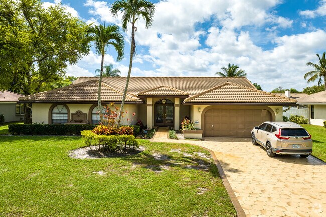 A lovely Mediterranean ranch home in the Pine Ridge neighborhood.