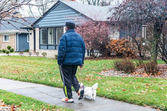 Woodhurst sidewalks provide a safe space to walk the dog.