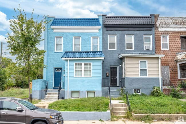 Some of the row homes in Lucille Park are vibrant colors.