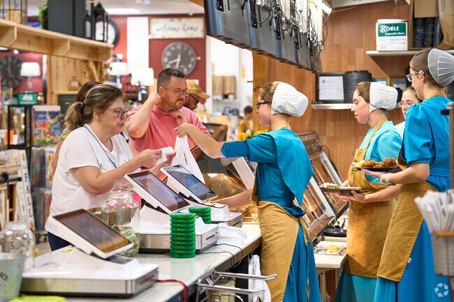 Patrons order food at one of many vendors in the Pennsylvania Dutch Market in Hagerstown.
