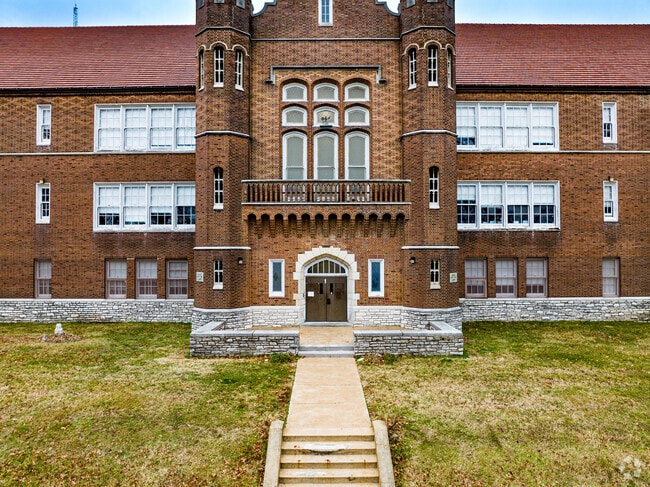 Students at New American Academy receive personalized instruction and support.