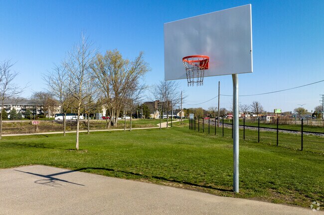 Burr Jones Park in Emerson East features open grassy fields and a basketball court.