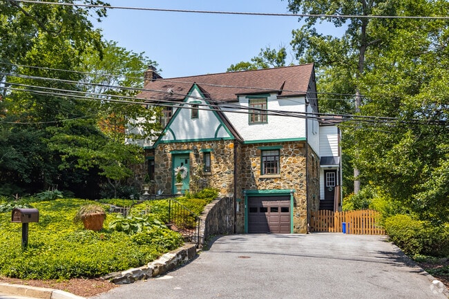 Gorgeous tudor-style home that looks as if it was pulled from a fairytale.
