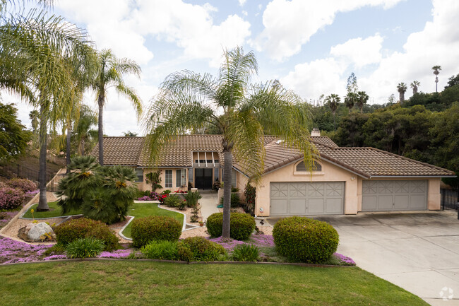 Many Mediterranean-style homes have beautiful landscaping in Daley Ranch.
