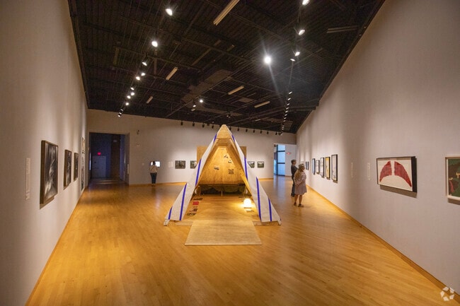 Patrons view the local exhibits inside of the Contemporary Art Museum in University Hillsborough.