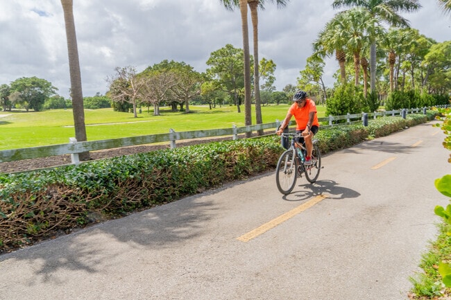 Cyclists enjoy scenic routes and wide-paved roads throughout Margate Gardens.