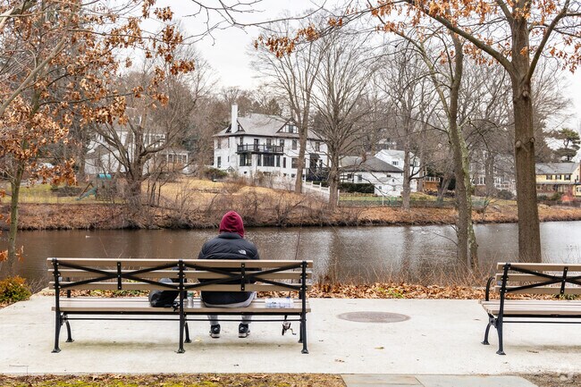 A young man tries to work out what's biting at Bullough's Pond near Newtonville.