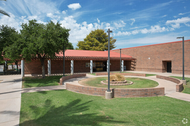 The entrance of Gilbert Elementary includes a large courtyard.