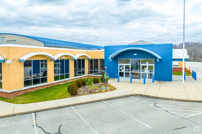 South Buffalo Elementary School welcomes students with a big blue arched entrance.