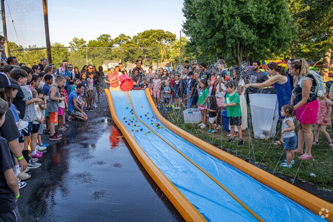 Fifty ducks race to the finish at Fanwood's Party in the Park.