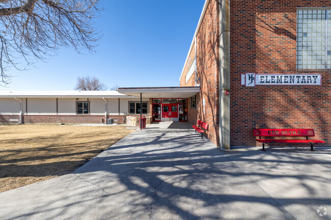 Playful recess activities at Huntley Project Elementary School promote social development.