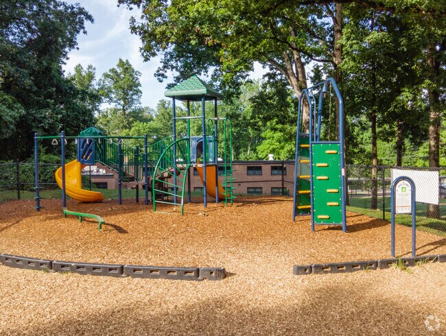 Kids enjoy the playground set at the St. Michael Catholic School in the town of Annandale.