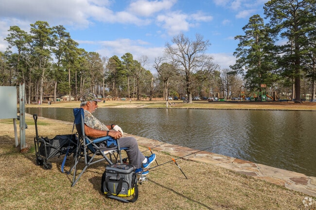 Visitors to Spring Lake Park can pick a quiet place by the lake to go fishing for the day.
