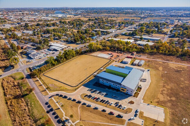 Here is an aerial view of Astec Charter Elementary School with the field