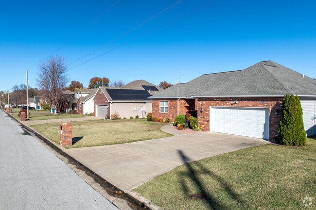 Many of the Iron Gates homes have red brick siding.