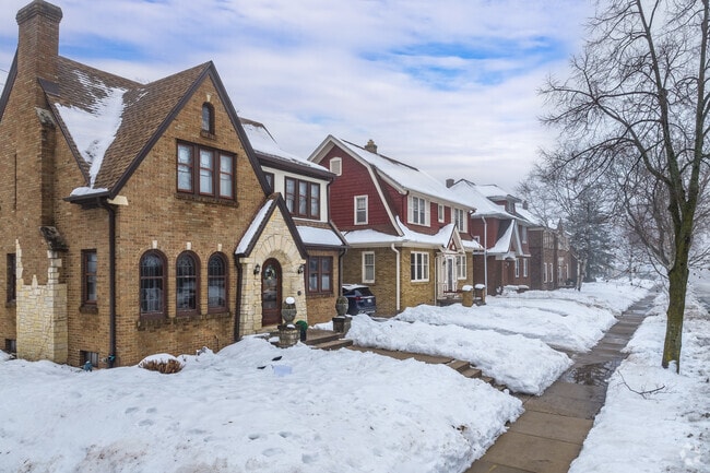 A brick Tudor home sits at a corner in Valley Forge.